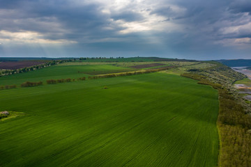 Flight over cultivating field in the spring. Moldova Republic of.