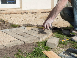 Building a terrace with measurements ruler, paving stone