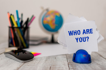 Handwriting text Who Are You question. Conceptual photo asking about demonstrating identity or...