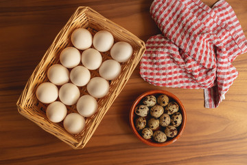 Fresh quail and chicken eggs ready to be cooked