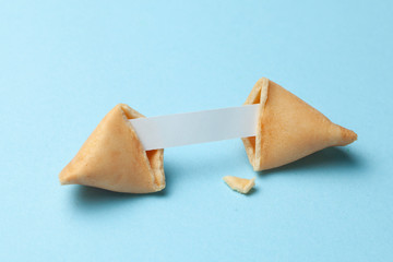 Chinese fortune cookies. Cookies with empty blank inside for prediction words. Blue background.