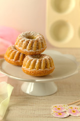 Summer mini bundt cakes with simple flavors on a rustic table