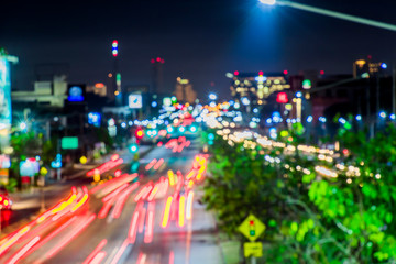Obraz premium Blur camera, long exposure on the road of city to go to center city.