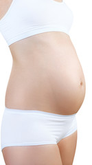 Pregnant woman with belly in the early stages of pregnancy.