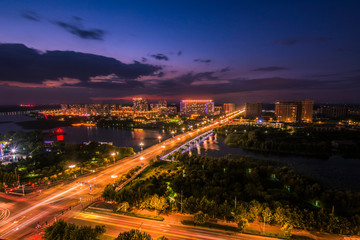 Fototapeta na wymiar Waterfront City Nightscape Skyline