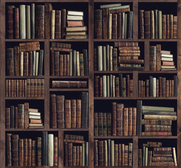 Fototapeta Collection of valuable ancient books on a bookshelf obraz