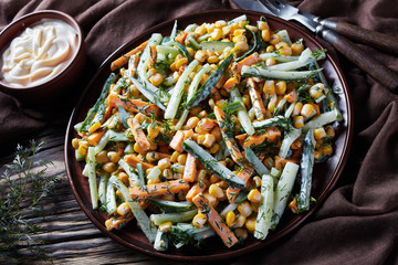 close-up of cucumber corn cheese dill salad