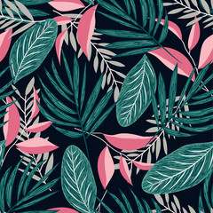 Seamless pattern with tropical leaves on a dark background. Vector design. Jungle print. Floral background.