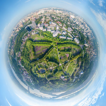 Globe panorama. stereographic projection of  green park and ciy view. 360 degree panorama. little planet