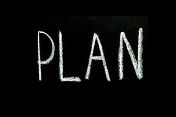 word "plan" written on chalkboard