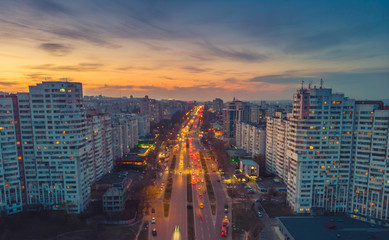 Beautiful night city. The gates of the city of Chisinau, Moldova, aerial view