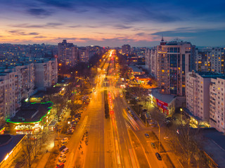 Fototapeta na wymiar Beautiful night city. The gates of the city of Chisinau, Moldova, aerial view