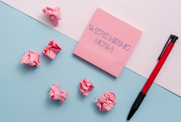 Conceptual hand writing showing We Re Hiring Now. Concept meaning recently employ someone or pay...
