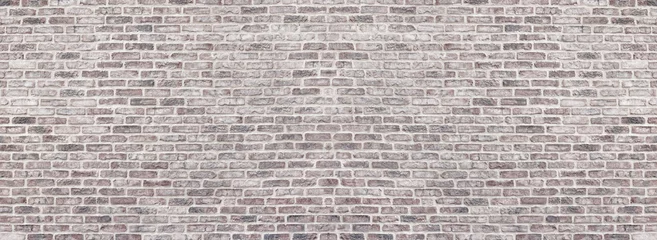 Fotobehang Bakstenen muur Brede lichtrode armoedige bakstenen muurtextuur. Oud metselwerkpanorama. Witgekalkte ruw metselwerk panoramisch vintage achtergrond