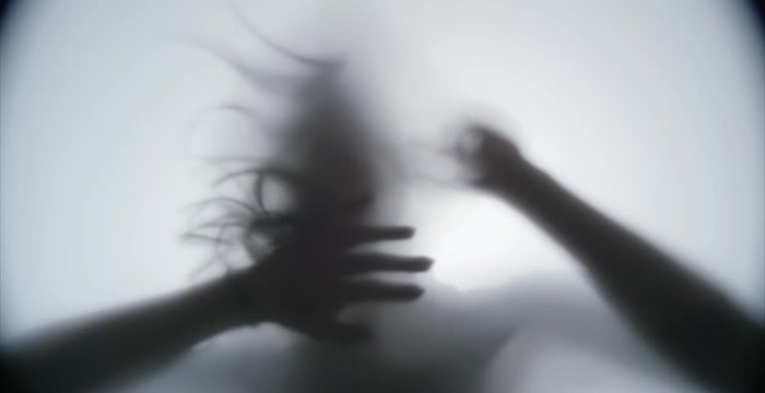 female silhouette on a white matte background