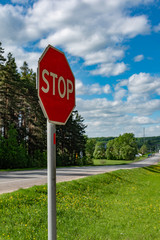 accident attention STOP sign on road