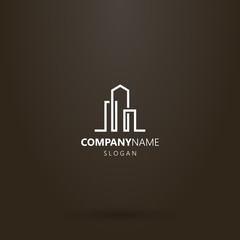 Fototapeta premium white logo on a black background. simple vector line art abstract logo of three high-rise buildings 