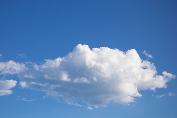 Big white cloud on blue sky