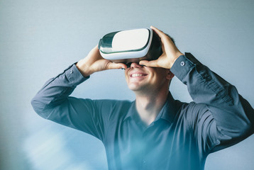 Young man with virtual glasses