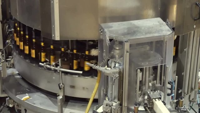 Line for bottling beer and labeling bottles