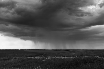 Black and white landscape photo of the stormy rain
