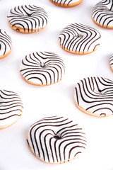 Fototapeta na wymiar Striped donuts on a white background.