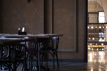 Vintage room cafe or restaurant. Tables opposite the window.