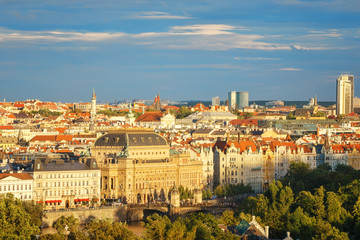 Fototapeta na wymiar .View of the red roofs of old Prague, the Vltava river and the embankment. Czech Republic.