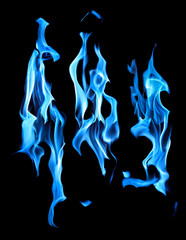 three bright sparks of blue flames on black