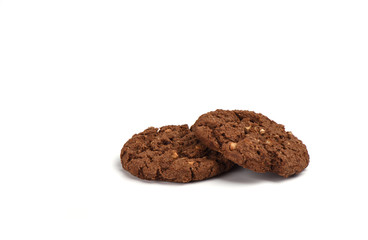 Cookies granola with chocolate and hazelnuts isolated on white background.