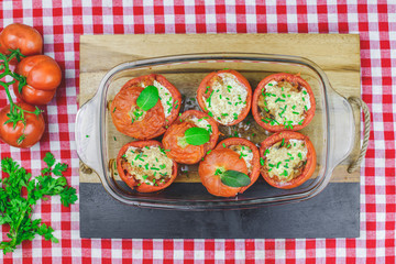 Tomato suffed with mushrooms and cheese