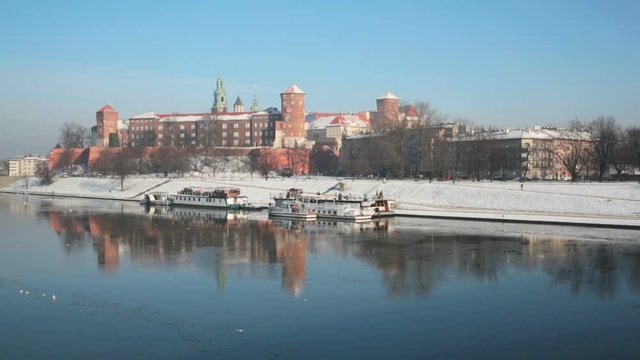 View of the Wawel castle and the Vistula River in Krakow in winter day