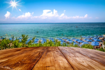 Fototapeta premium Desk of free space and summer beach background 