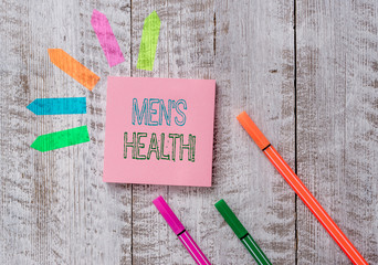 Text sign showing Men S Health. Business photo text state of complete physical mental and social well being by analysis Plain note paper and line arrow stickers on the top of wooden table desk