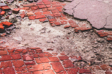 Cracked asphalt red texture abstract background cracks on asphalt road