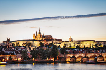 Evening in Prague. View of Prague Castle, Charles Bridge and the Vltava River Embankment. Czech Republic.