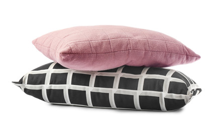 Soft color pillows on white background