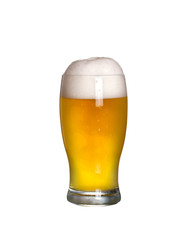 Glass of beer with cap of foam. Glass of ale isolated on white background