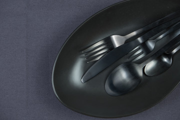 Black matte tableware. Black cutlery.