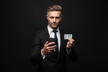 Confident attractive businessman wearing suit