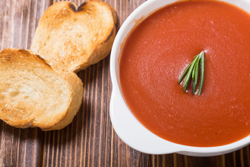 Fresh tomato cream soup in bowl