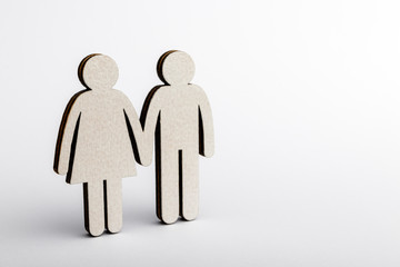 Family and couple concept. Wooden figures.