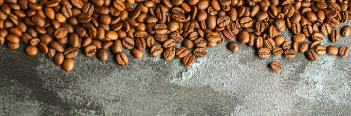 coffee beans (good and bad grain) - arabica and robusta blend (roasted coffee grain). Black background. Top view . Copy space.