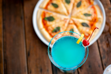 Pizza and ice summer drink