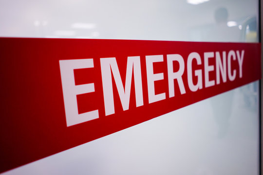 Red emergency room signs and patients who look scary