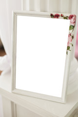 Blank white vintage photo frame. Close-up