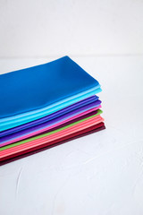 A Group of Twisted Colored Fabric on white