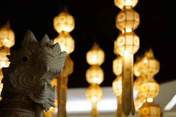 head of old style hand made lion statue for decoration on black background