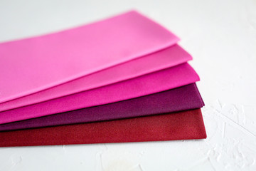 A Group of red palete Fabric on white