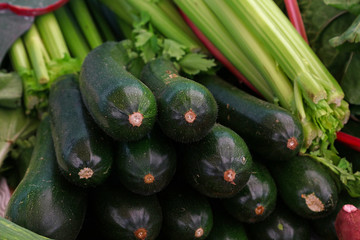 Close up fresh green zucchini on retail display